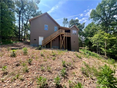 Must see new construction centrally located between Lake Ann and on Bella Vista - Metfield Golf Complex and Country Club in Arkansas - for sale on GolfHomes.com, golf home, golf lot