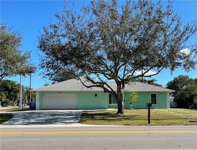 Welcome to a beautifully maintained gem sitting proudly on an on Golden Gate Country Club in Florida - for sale on GolfHomes.com, golf home, golf lot