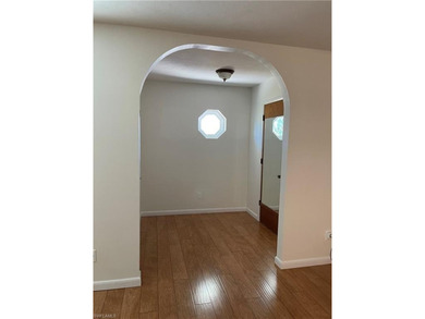 Welcome to a beautifully maintained gem sitting proudly on an on Golden Gate Country Club in Florida - for sale on GolfHomes.com, golf home, golf lot