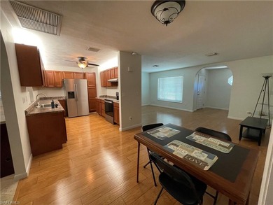 Welcome to a beautifully maintained gem sitting proudly on an on Golden Gate Country Club in Florida - for sale on GolfHomes.com, golf home, golf lot