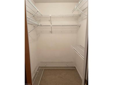 Welcome to a beautifully maintained gem sitting proudly on an on Golden Gate Country Club in Florida - for sale on GolfHomes.com, golf home, golf lot