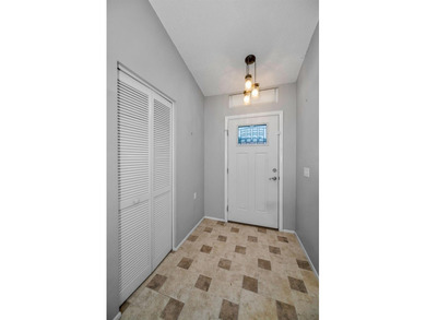 IN TIMBER GREENS A 55+ GATED GOLF COMMUNITY.....This 2-bedroom on Timber Greens Country Club in Florida - for sale on GolfHomes.com, golf home, golf lot