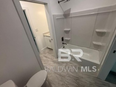 New Gold fortified home, with ceramic tile throughout the entire on Glenlakes Golf Club in Alabama - for sale on GolfHomes.com, golf home, golf lot