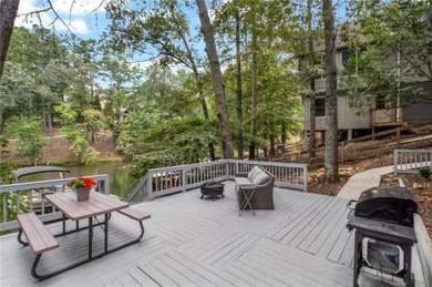 Discover your dream deep water cove home in the beautiful Lake on The Highlands Course at Lake Arrowhead in Georgia - for sale on GolfHomes.com, golf home, golf lot