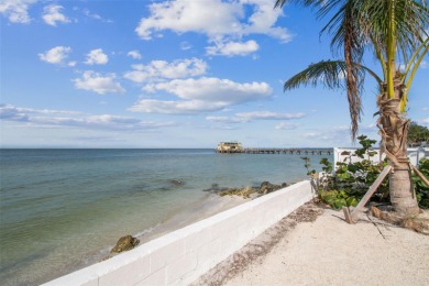 Discover your beachfront oasis directly on Tampa Bay! Step out on Key Royale Club in Florida - for sale on GolfHomes.com, golf home, golf lot