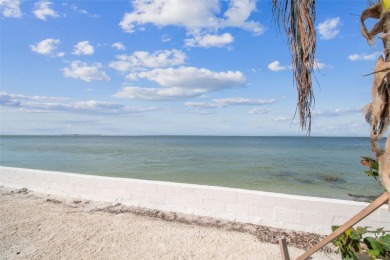 Discover your beachfront oasis directly on Tampa Bay! Step out on Key Royale Club in Florida - for sale on GolfHomes.com, golf home, golf lot