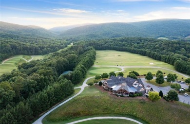 Discover your dream deep water cove home in the beautiful Lake on The Highlands Course at Lake Arrowhead in Georgia - for sale on GolfHomes.com, golf home, golf lot