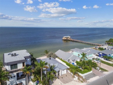 Discover your beachfront oasis directly on Tampa Bay! Step out on Key Royale Club in Florida - for sale on GolfHomes.com, golf home, golf lot