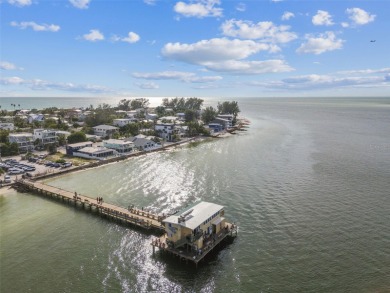 Discover your beachfront oasis directly on Tampa Bay! Step out on Key Royale Club in Florida - for sale on GolfHomes.com, golf home, golf lot