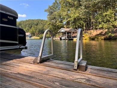 Discover your dream deep water cove home in the beautiful Lake on The Highlands Course at Lake Arrowhead in Georgia - for sale on GolfHomes.com, golf home, golf lot