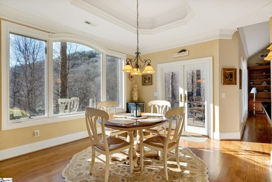 Thoughtfully designed and beautifully updated, this charming on The Cliffs at Glassy Golf and Country Club in South Carolina - for sale on GolfHomes.com, golf home, golf lot