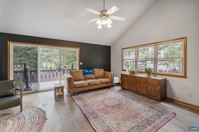 Step inside this spacious, contemporary home filled with soaring on Lake Monticello Golf Course in Virginia - for sale on GolfHomes.com, golf home, golf lot