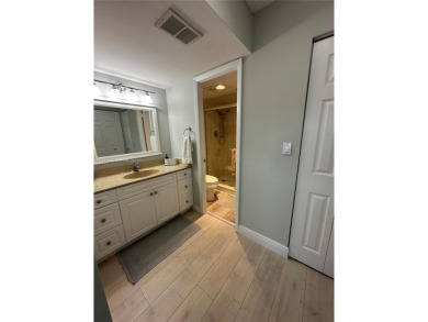 Discover this charming condo with 2 bedrooms and 2 bathrooms on Pembroke Lakes Golf Club in Florida - for sale on GolfHomes.com, golf home, golf lot