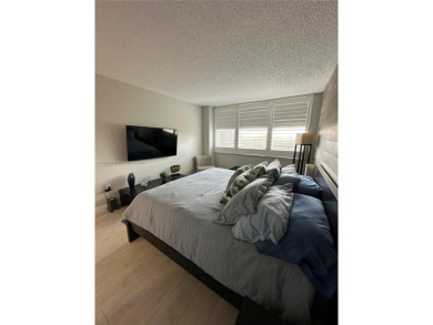 Discover this charming condo with 2 bedrooms and 2 bathrooms on Pembroke Lakes Golf Club in Florida - for sale on GolfHomes.com, golf home, golf lot