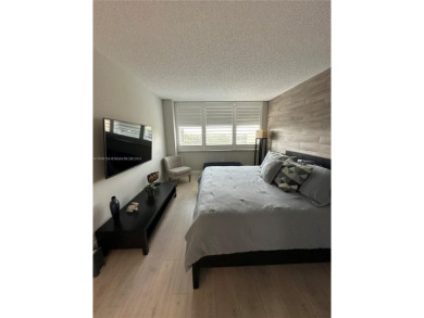 Discover this charming condo with 2 bedrooms and 2 bathrooms on Pembroke Lakes Golf Club in Florida - for sale on GolfHomes.com, golf home, golf lot