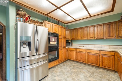 Stunning custom built 4 bedroom, 2 bath Home nestled on 1 acre on Alderbrook Golf Course in Oregon - for sale on GolfHomes.com, golf home, golf lot