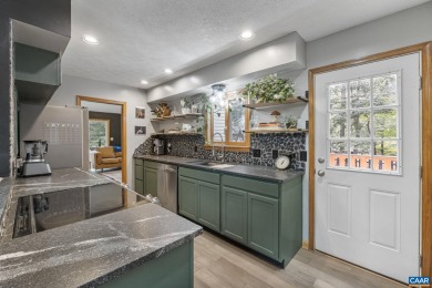 Step inside this spacious, contemporary home filled with soaring on Lake Monticello Golf Course in Virginia - for sale on GolfHomes.com, golf home, golf lot
