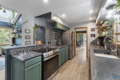 Step inside this spacious, contemporary home filled with soaring on Lake Monticello Golf Course in Virginia - for sale on GolfHomes.com, golf home, golf lot