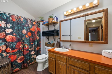 Stunning custom built 4 bedroom, 2 bath Home nestled on 1 acre on Alderbrook Golf Course in Oregon - for sale on GolfHomes.com, golf home, golf lot