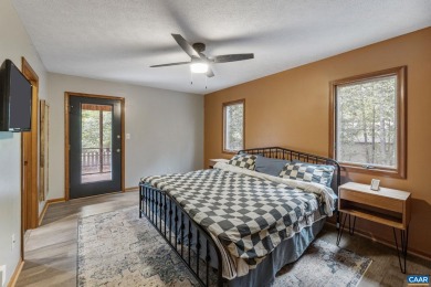 Step inside this spacious, contemporary home filled with soaring on Lake Monticello Golf Course in Virginia - for sale on GolfHomes.com, golf home, golf lot