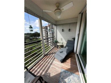 Discover this charming condo with 2 bedrooms and 2 bathrooms on Pembroke Lakes Golf Club in Florida - for sale on GolfHomes.com, golf home, golf lot