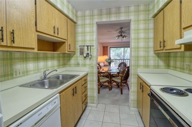 Enjoy your mornings spent strolling through the lush meadows on The Meadows Golf and Country Club in Florida - for sale on GolfHomes.com, golf home, golf lot