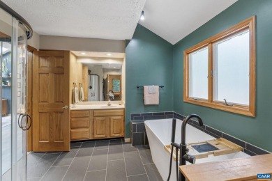 Step inside this spacious, contemporary home filled with soaring on Lake Monticello Golf Course in Virginia - for sale on GolfHomes.com, golf home, golf lot