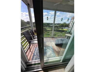 Discover this charming condo with 2 bedrooms and 2 bathrooms on Pembroke Lakes Golf Club in Florida - for sale on GolfHomes.com, golf home, golf lot