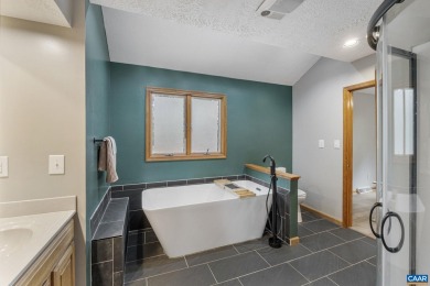 Step inside this spacious, contemporary home filled with soaring on Lake Monticello Golf Course in Virginia - for sale on GolfHomes.com, golf home, golf lot