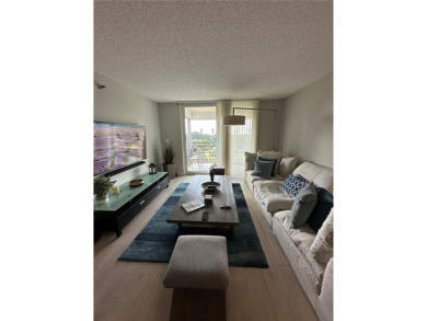 Discover this charming condo with 2 bedrooms and 2 bathrooms on Pembroke Lakes Golf Club in Florida - for sale on GolfHomes.com, golf home, golf lot