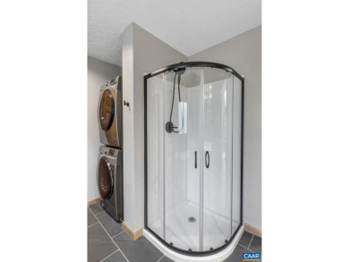 Step inside this spacious, contemporary home filled with soaring on Lake Monticello Golf Course in Virginia - for sale on GolfHomes.com, golf home, golf lot