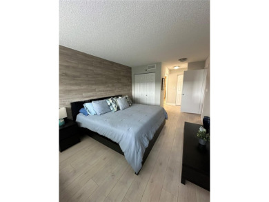 Discover this charming condo with 2 bedrooms and 2 bathrooms on Pembroke Lakes Golf Club in Florida - for sale on GolfHomes.com, golf home, golf lot