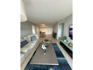 Discover this charming condo with 2 bedrooms and 2 bathrooms on Pembroke Lakes Golf Club in Florida - for sale on GolfHomes.com, golf home, golf lot