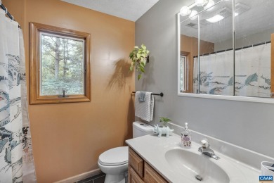 Step inside this spacious, contemporary home filled with soaring on Lake Monticello Golf Course in Virginia - for sale on GolfHomes.com, golf home, golf lot