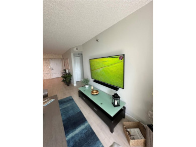 Discover this charming condo with 2 bedrooms and 2 bathrooms on Pembroke Lakes Golf Club in Florida - for sale on GolfHomes.com, golf home, golf lot