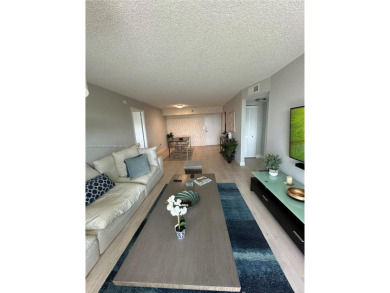 Discover this charming condo with 2 bedrooms and 2 bathrooms on Pembroke Lakes Golf Club in Florida - for sale on GolfHomes.com, golf home, golf lot