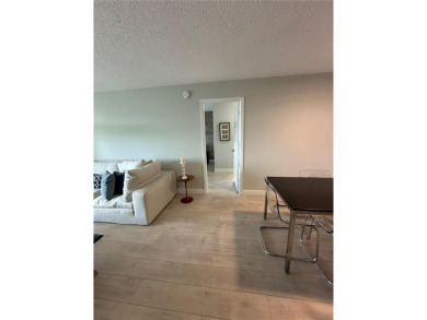 Discover this charming condo with 2 bedrooms and 2 bathrooms on Pembroke Lakes Golf Club in Florida - for sale on GolfHomes.com, golf home, golf lot