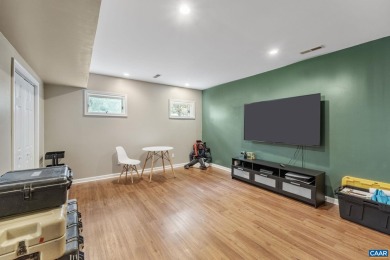 Step inside this spacious, contemporary home filled with soaring on Lake Monticello Golf Course in Virginia - for sale on GolfHomes.com, golf home, golf lot