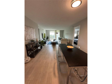 Discover this charming condo with 2 bedrooms and 2 bathrooms on Pembroke Lakes Golf Club in Florida - for sale on GolfHomes.com, golf home, golf lot