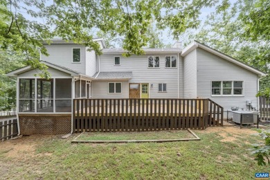 Step inside this spacious, contemporary home filled with soaring on Lake Monticello Golf Course in Virginia - for sale on GolfHomes.com, golf home, golf lot