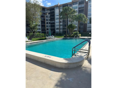 Discover this charming condo with 2 bedrooms and 2 bathrooms on Pembroke Lakes Golf Club in Florida - for sale on GolfHomes.com, golf home, golf lot