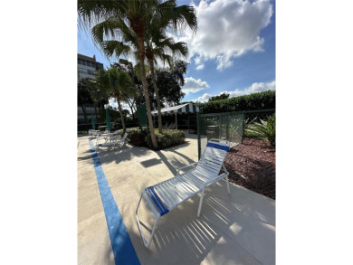 Discover this charming condo with 2 bedrooms and 2 bathrooms on Pembroke Lakes Golf Club in Florida - for sale on GolfHomes.com, golf home, golf lot