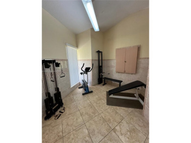 Discover this charming condo with 2 bedrooms and 2 bathrooms on Pembroke Lakes Golf Club in Florida - for sale on GolfHomes.com, golf home, golf lot