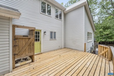 Step inside this spacious, contemporary home filled with soaring on Lake Monticello Golf Course in Virginia - for sale on GolfHomes.com, golf home, golf lot