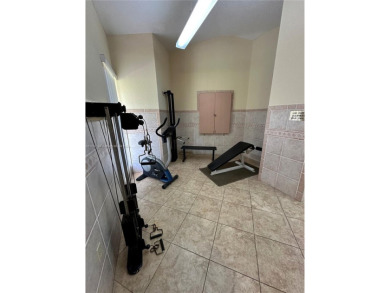 Discover this charming condo with 2 bedrooms and 2 bathrooms on Pembroke Lakes Golf Club in Florida - for sale on GolfHomes.com, golf home, golf lot