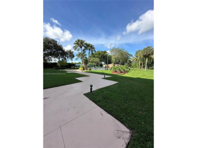 Discover this charming condo with 2 bedrooms and 2 bathrooms on Pembroke Lakes Golf Club in Florida - for sale on GolfHomes.com, golf home, golf lot