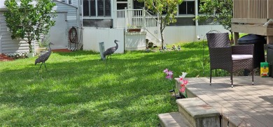 This charming 2022 Factory Expo Direct Park Model sits on one of on Glen Lakes Country Club in Florida - for sale on GolfHomes.com, golf home, golf lot