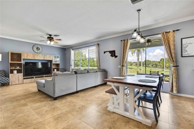 Commanding golf course views and elegant architectural details on Heritage Harbor Golf and Country Club in Florida - for sale on GolfHomes.com, golf home, golf lot