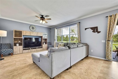 Commanding golf course views and elegant architectural details on Heritage Harbor Golf and Country Club in Florida - for sale on GolfHomes.com, golf home, golf lot