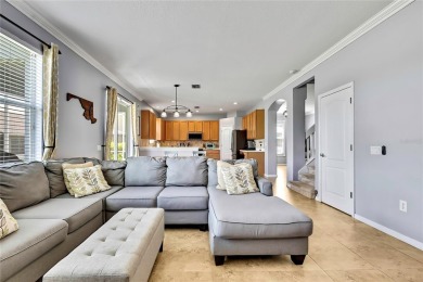 Commanding golf course views and elegant architectural details on Heritage Harbor Golf and Country Club in Florida - for sale on GolfHomes.com, golf home, golf lot